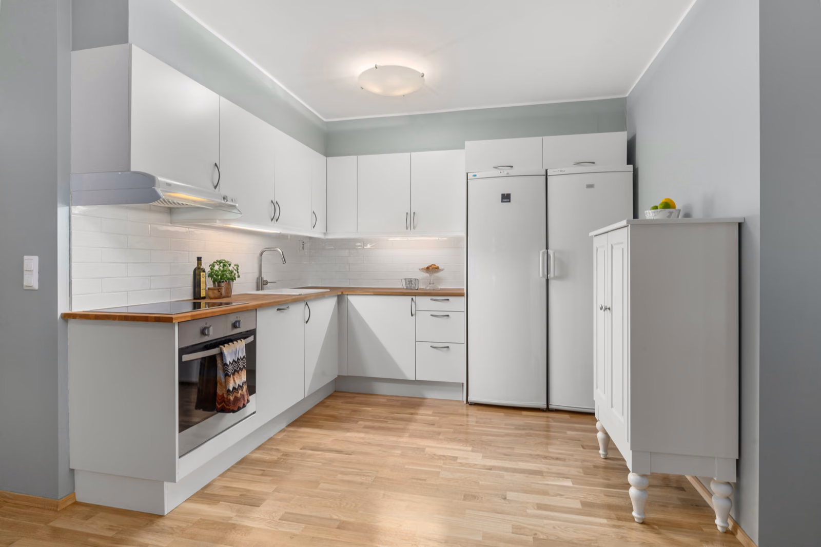 Another common element of a rustic kitchen is stone, metal, or wood